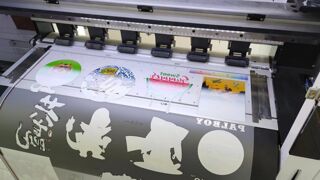 DTF transfer roll printing names, numbers, and role tags on event t-shirts; flexible placements and quick top-ups for crew, volunteers, and exhibitors.